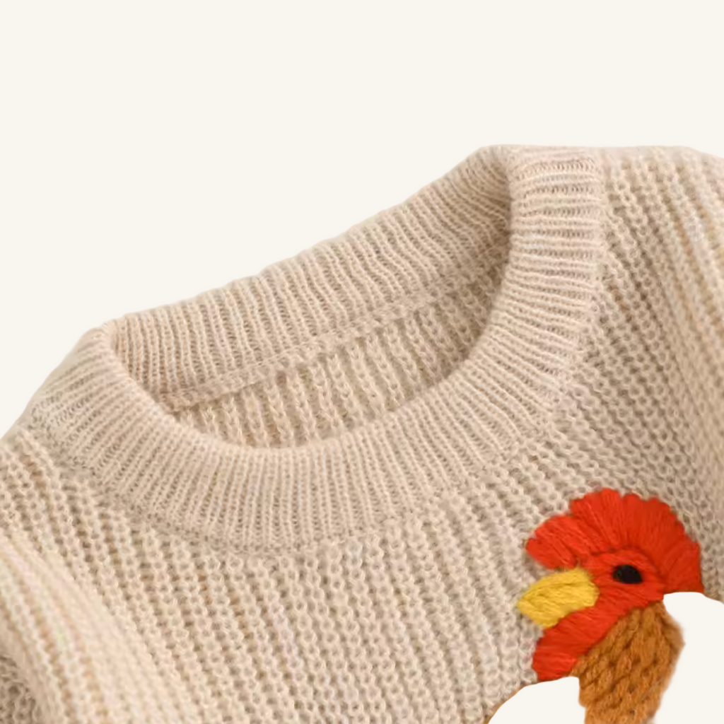 Gebreide trui met haan